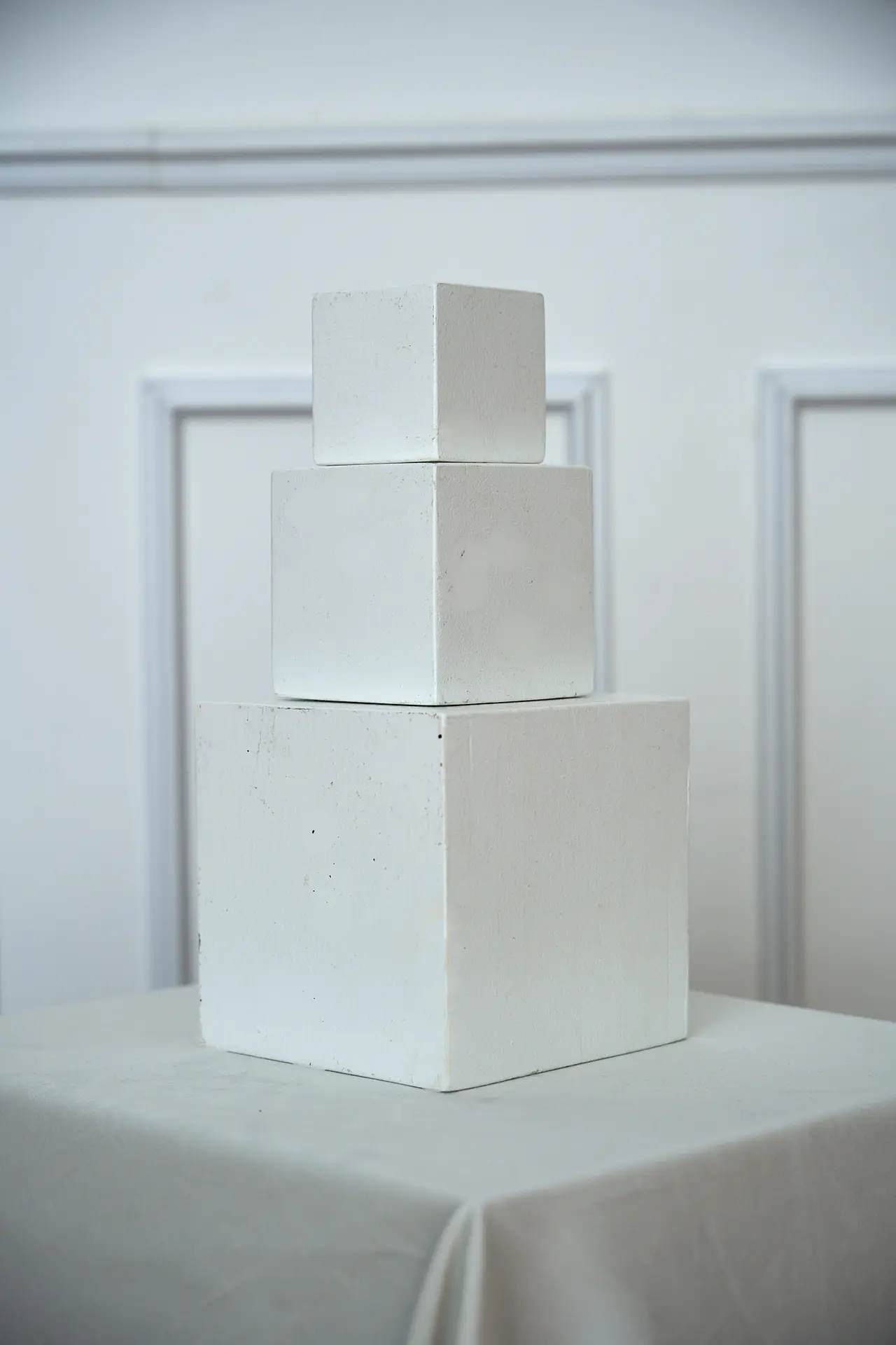 White plaster display cubes